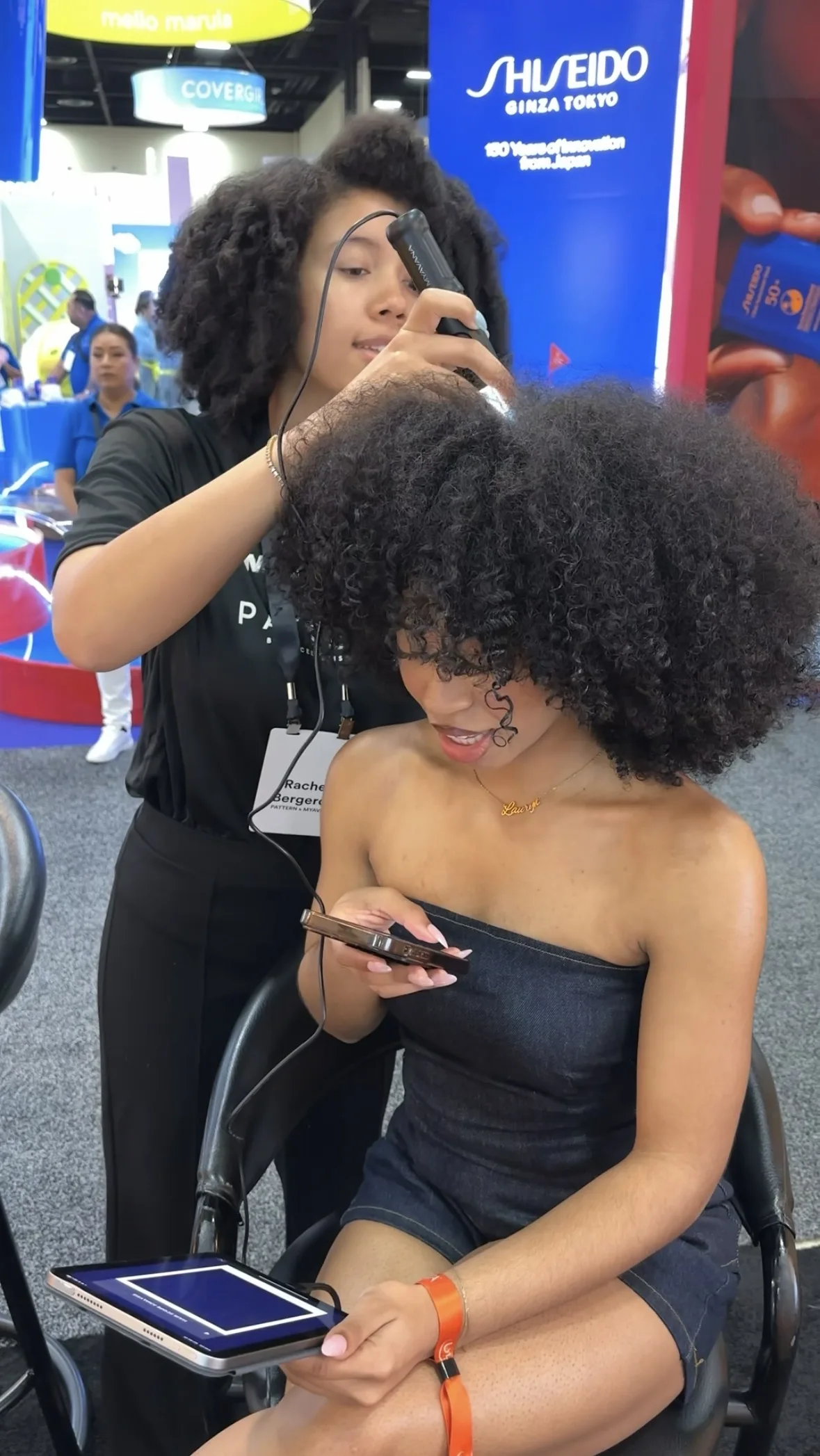 Rachel analyzing hair live at the PATTERN x MYAVANA activation